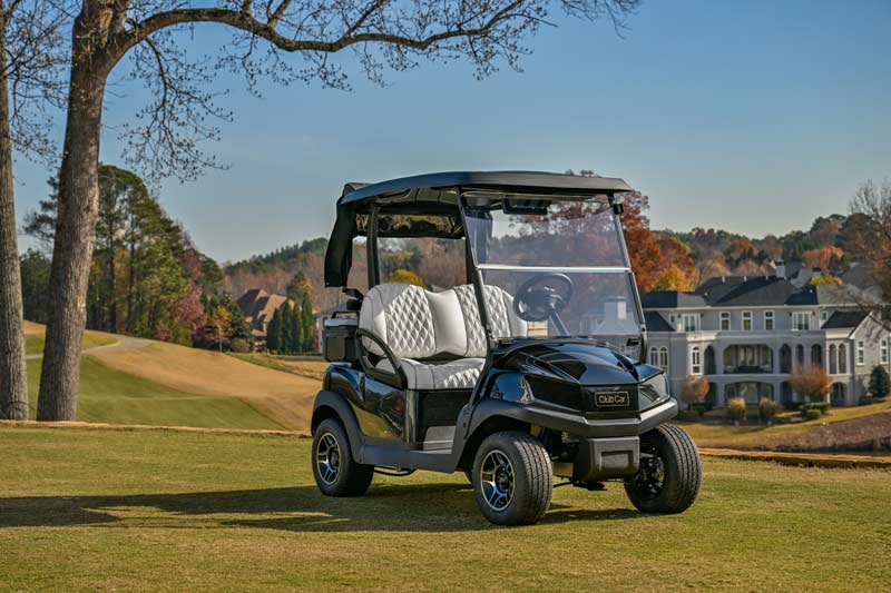 Parked golf cart on golf course